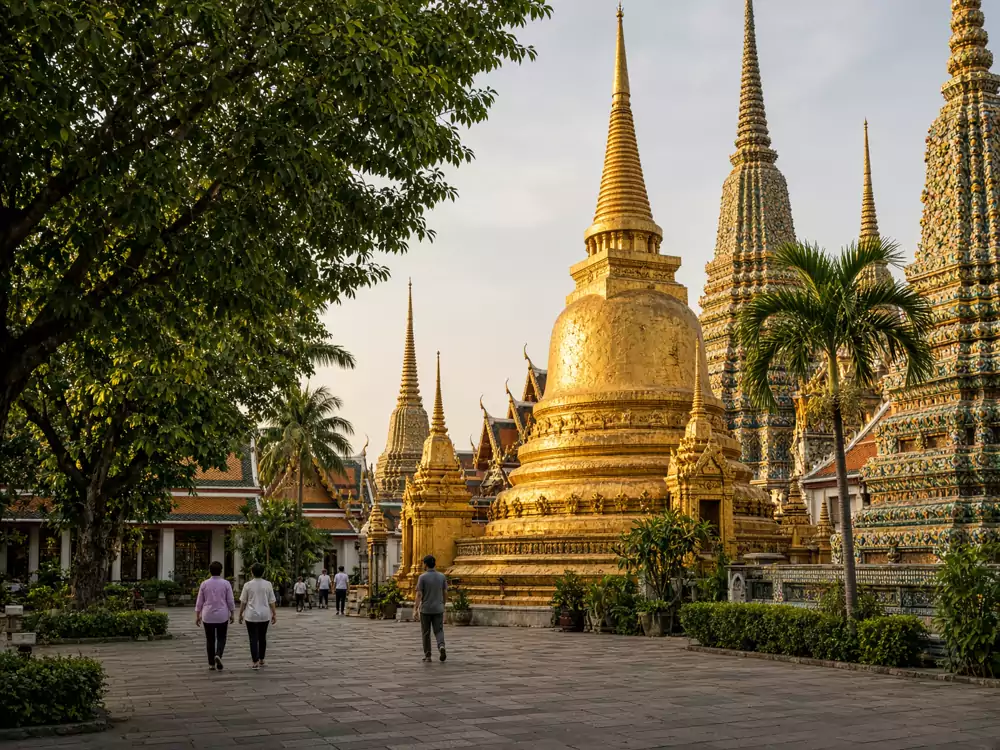 Golden temple spires and historic courtyards in Bangkok